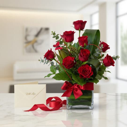 Arreglo floral Solitario ROSETTA con seis rosas rojas frescas en jarrón de cristal, tarjeta de regalo 'With Love' y cinta de